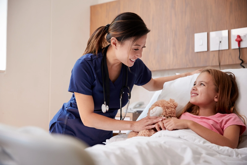 Pediatric Home Visits with a nurse attending to a young patient